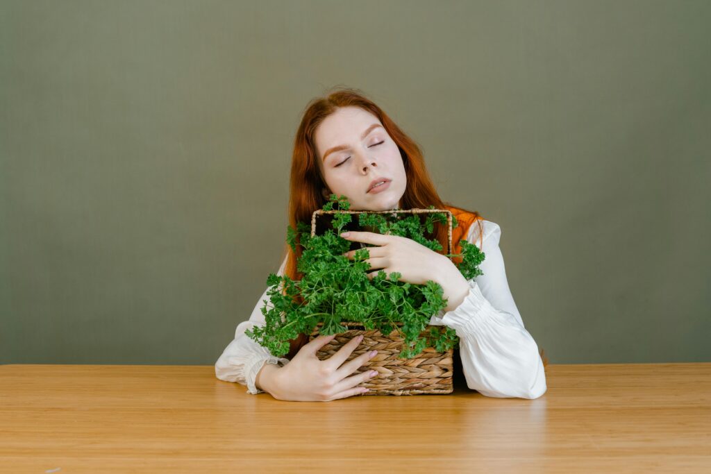 a lady with a Holistic Nutrition pot